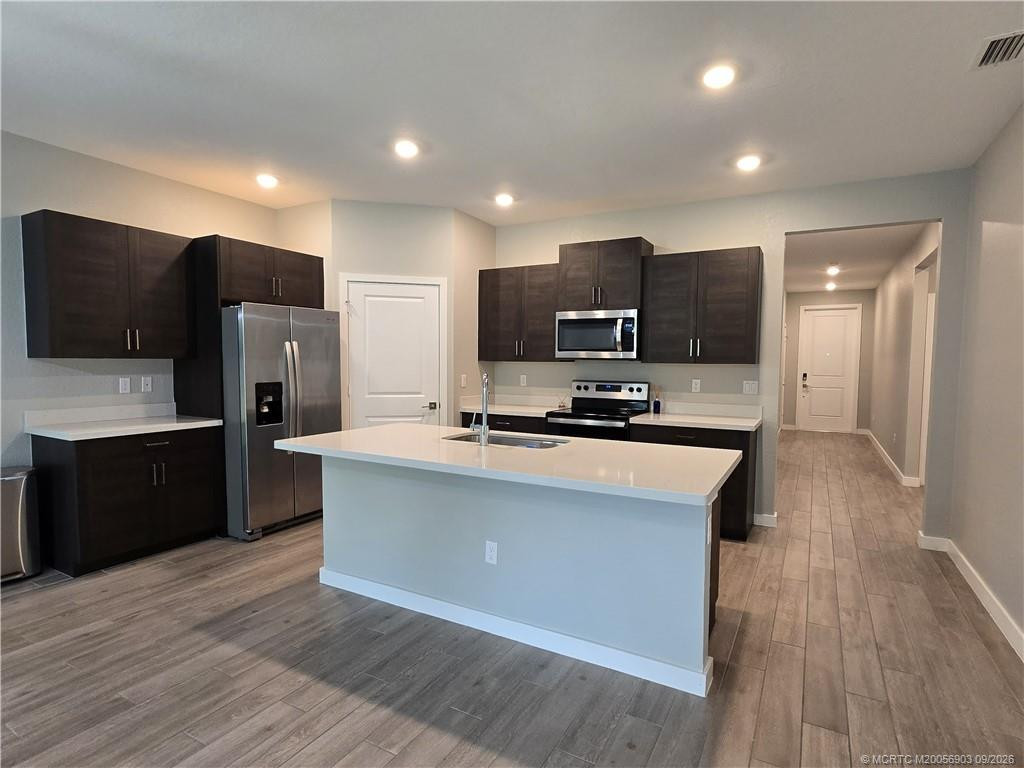 Property photo for 1404 NE White Pine Terrace, Ocean Breeze, FL 34957