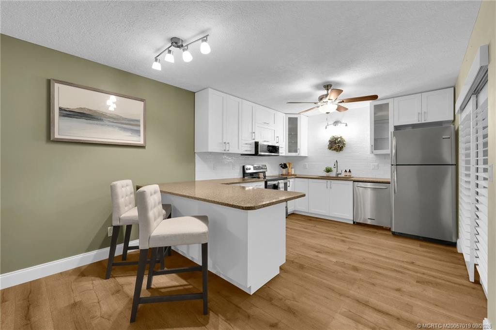 Photo 3 at 6508 SE Windsong Lane, Stuart