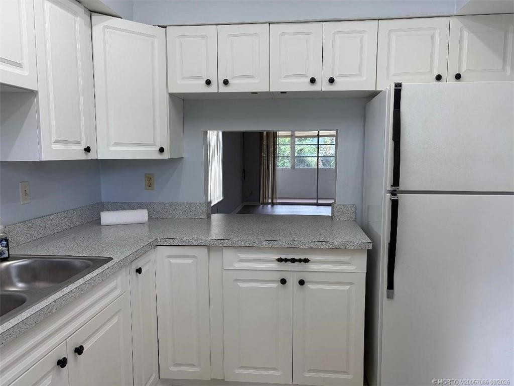 Kitchen pass thru to dining area