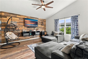 Living room featuring wood accent wall