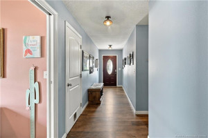 Interior hallway connecting bedroom wing