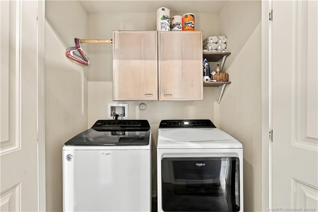 Laundry area with washer and dryer hookups