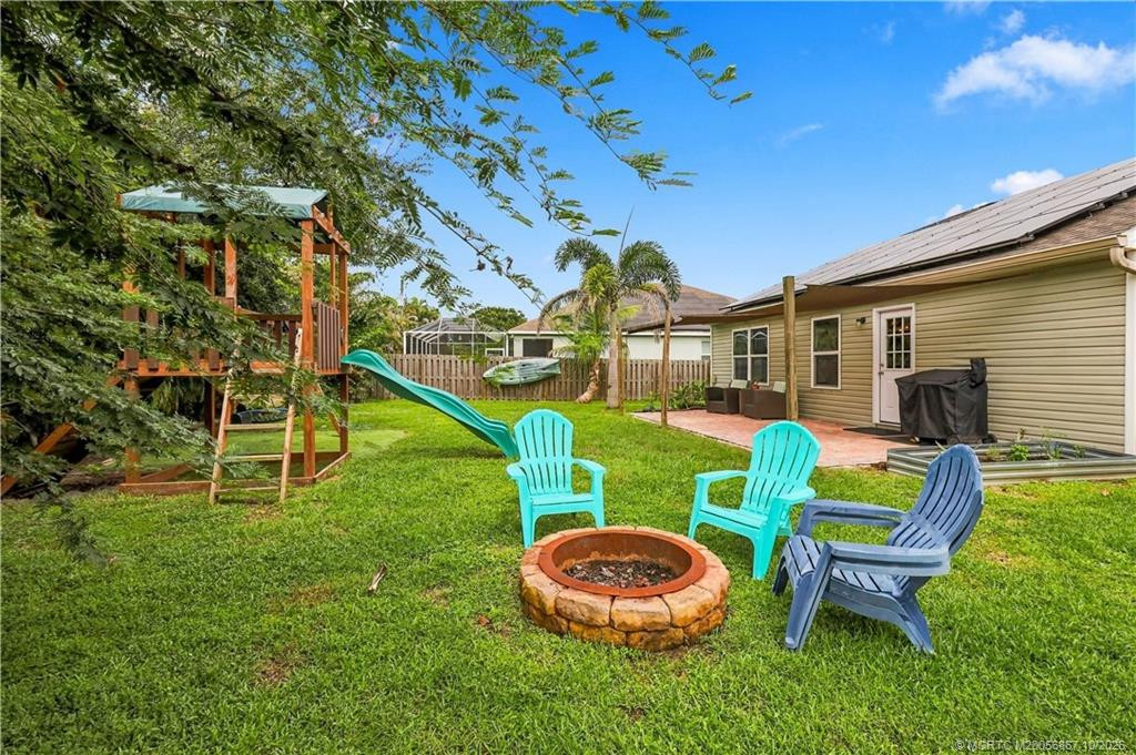 Backyard featuring fire pit