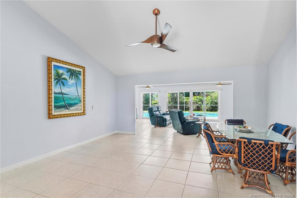 Large open Great Room, with views to large heated pool and spa