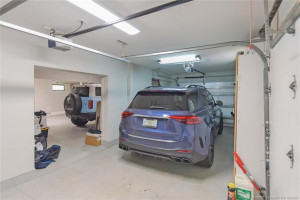 3rd garage bay: deep enough for boat trailer