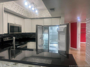 ALL REDONE KITCHEN, SO BEAUTIFUL. GRANITE AND STAINLESS APPLIANCES. GREAT LIGHTING. SO CLEAN. DOWN THE HALL GOES TO MAIN BEDROOM AND SECOND BEDROOM.