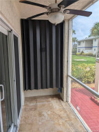 WITH A STORAGE AREA BEHIND THE DOOR YOU CAN WALK OUTSIDE. ALL TILED AND FAN.