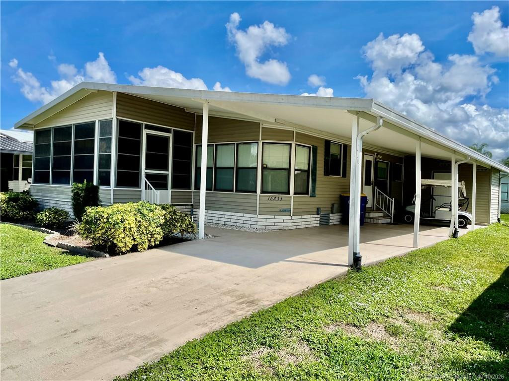 2 bedroom Manufactured Home at 16235 SW Indianwood Circle, Indianwood Golf & Country Club, Indiantown — photo 1