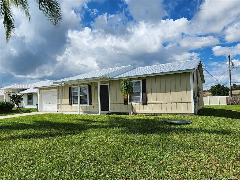 Property photo for 1013 SW California Boulevard, Port St. Lucie, FL 34953