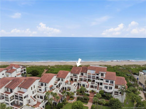 Elevated aerial perspective showcasing The Dune's distinctive architecture and exceptional beachfront location.