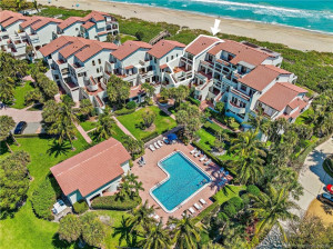 Aerial view identifies the residence within The Dune, with the community pool and Atlantic Ocean just steps away.