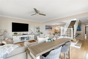 Open living space offers plenty of room for entertaining with the dining area and kitchen conveniently nearby.