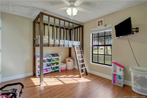 #3 Bedroom custom built bed VL flooring and picture window