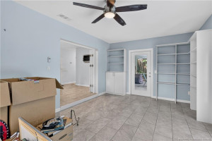 Back porch with built-ins & door to the patio