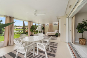 Peaceful screened back patio with lake view