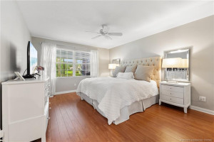 Primary bedroom with lake views