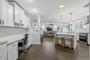 Spacious, open-concept living with attractive wood-look flooring, coastal-inspired finishes, and seamless flow between gathering spaces.