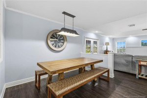 Inviting dining area conveniently located off the kitchen, perfect for casual meals and entertaining.
