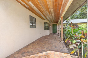 Entry porch with tongue & groove ceiling.