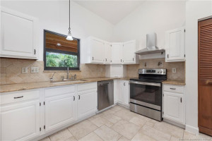 Kitchen with solid oak cabinets and granite counters.