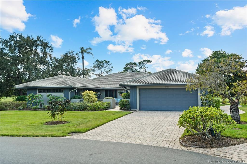 1423 SW Troon Circle, Palm City, FL 34990 in Palm City - property photo