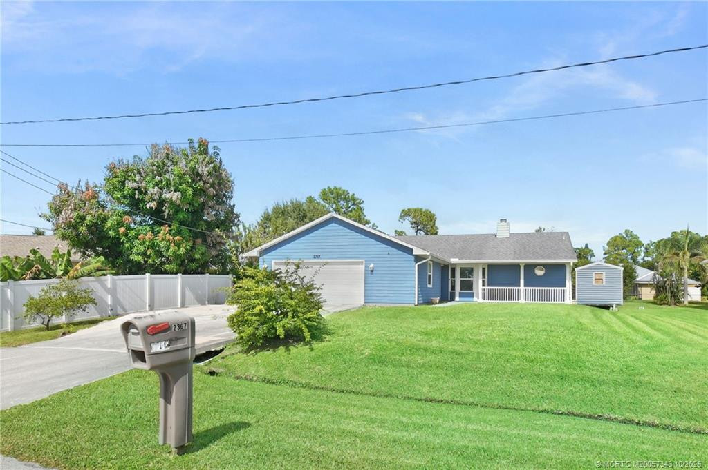 2367 SW Madrid Road, Port St. Lucie, FL 34953 in Port St. Lucie - property photo