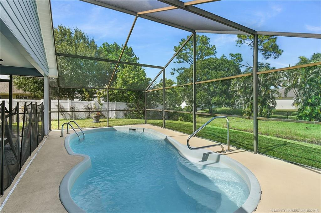 2367 SW Madrid Road, Port St. Lucie, FL 34953 in Port St. Lucie - property photo 2