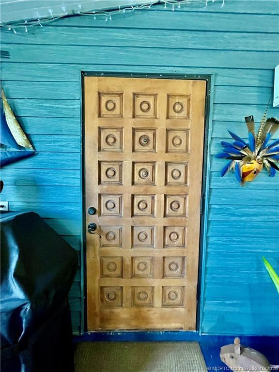 Vintage wooden decorative door to large storage shed