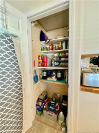 Additional walk in storage room off of dining area