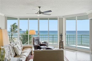 Floor-to-ceiling windows showcase sweeping Atlantic Ocean views from the main living area.