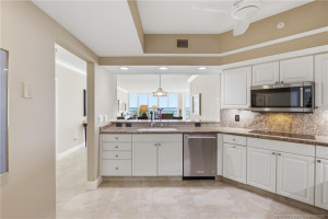 Enjoy ocean views from the kitchen, which opens to the dining and living areas for easy entertaining.