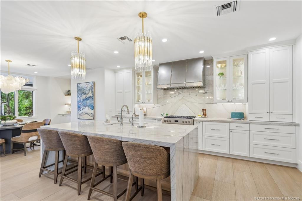 Everyone will want to gather in this stunning kitchen