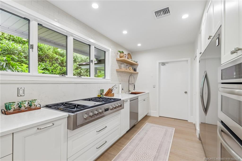 A beautifully appointed secondary kitchen designed for serious cooking and seamless entertaining.