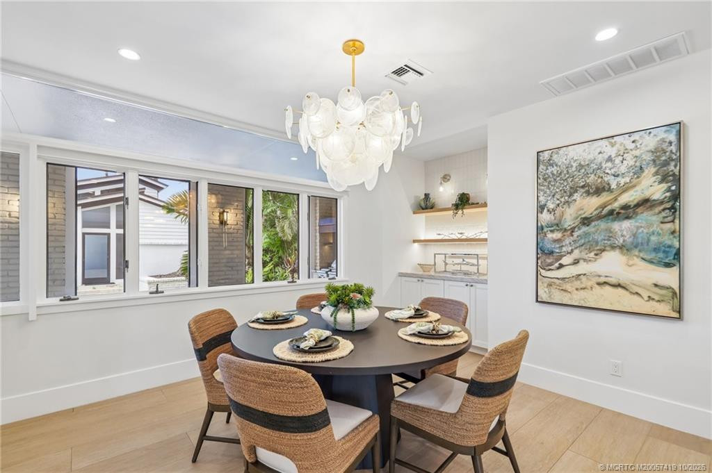 An intimate dining space with designer lighting