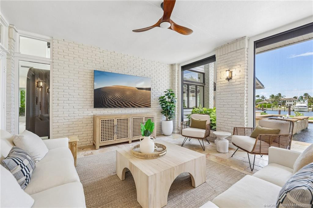 Stunning screened room blends indoor and outdoor living