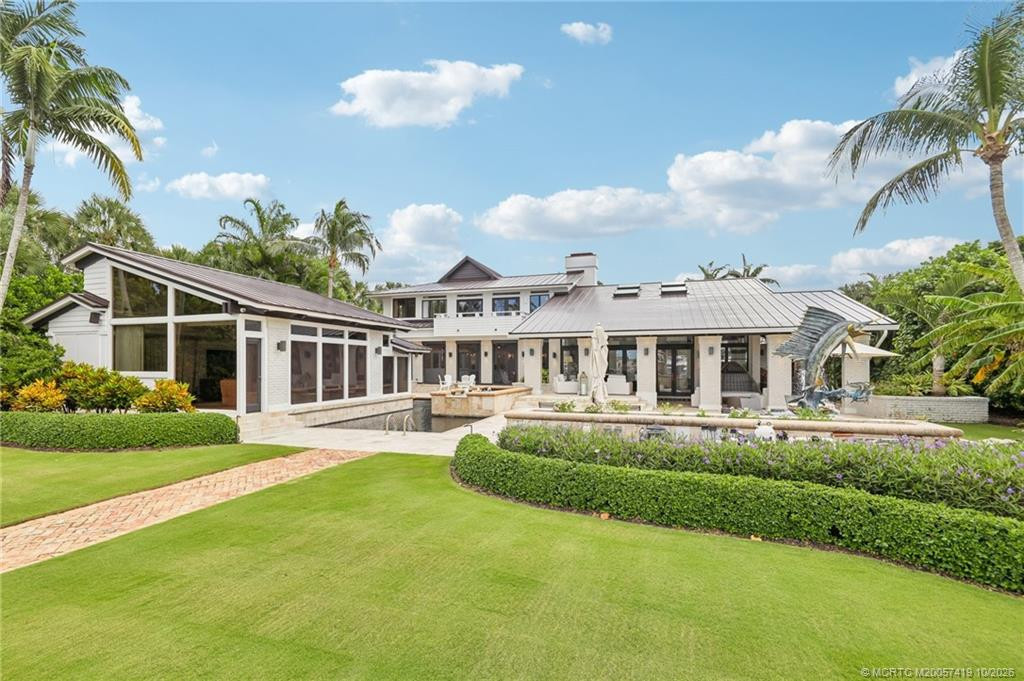 Expansive grounds complement the estate's striking architectural design