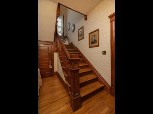 Photo for 411 W Center Street, Lake City, MN 55041 - Listing #5629687 Open staircase to upper level, Main floor 1/2 bath through door