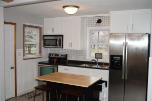 Photo for 2101 1st Avenue SE, Austin, MN 55912 - Listing #5684317 New kitchen - center island and stools to stay