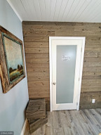 Photo for 11815 61st Avenue N, Plymouth, MN 55442 - Listing #5685157 Large space, perfect for pantry or kitchen storage. Wall (& kitchen island) have barnboard accents.