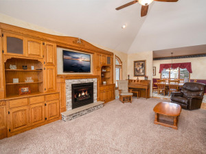 Photo for 304 10th Avenue W, Lamberton, MN - Listing #5717994 The main floor living room flows along entire west wall of home, featuring custom built-ins, surround sound, gas fireplace & ceiling fan - for the ultimate in comfort and relaxation.
