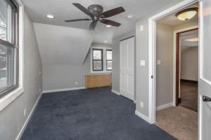 Photo for 904 14th Avenue NE, Austin, MN 55912 - Listing #5716230 Upstairs bedroom, new flooring, updated lighting, newly sheet rocked