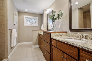 Photo for 5633 Tracy Avenue, Edina, MN 55436 - Listing #5715166 Master bathroom features a double vanity and custom walk-in shower