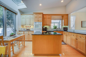 Photo for 4611 Bayswater Road, Excelsior, MN 55331 - Listing #5725865 Bright & sunny Eat-In Kitchen, Maple Floors and Cabinets, Granite Countertops, Granite-Composite Sink, and Plenty of Storage.