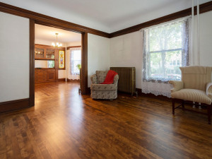 Photo for 3655 Pleasant Avenue, Minneapolis, MN 55409 - Listing #6006077 11 Ft ceilings. View from living room into the dining room. Large windows allows plenty of natural light in. Wood crown molding and high baseboards.