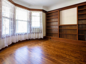 Photo for 3655 Pleasant Avenue, Minneapolis, MN 55409 - Listing #6006077 Adjacent to the living room is this library/family room that offers a wall of built-in shelving. Bay windows allows for a sun filled room. Look at the coved ceilings. Amazing!