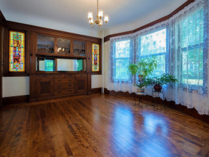 Photo for 3655 Pleasant Avenue, Minneapolis, MN 55409 - Listing #6006077 Gorgeous formal dining room with a built-in buffet with leaded glass, flanked by original stained glass windows and bay windows. Timeless mill work you just don't see very often.