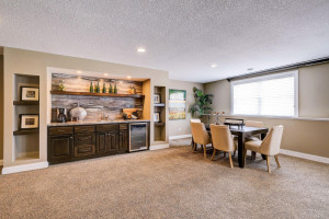 Photo for 5173 Suntide Pass, Woodbury, MN 55129 - Listing #6006439 Entertain your guests at this sophisticated bar with wine fridge & built-in shelving.