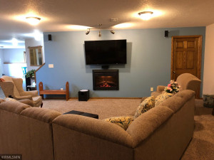 Photo for 995 166th Street, Hammond, WI - Listing #6025606 Mounted TV, Sleeper Sectional and Electric Fireplace will remain with home.