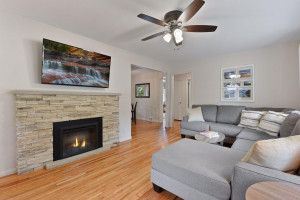 Photo for 6819 W 23rd Street, MN 55426 - Listing #6022266 Living room with new fireplace and fresh paint throughout.