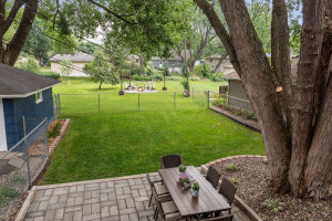 Photo for 6819 W 23rd Street, MN 55426 - Listing #6022266 THE YARD EXTENDS PAST FENCED AREA. New paver patio and fenced area of yard for pets or play.